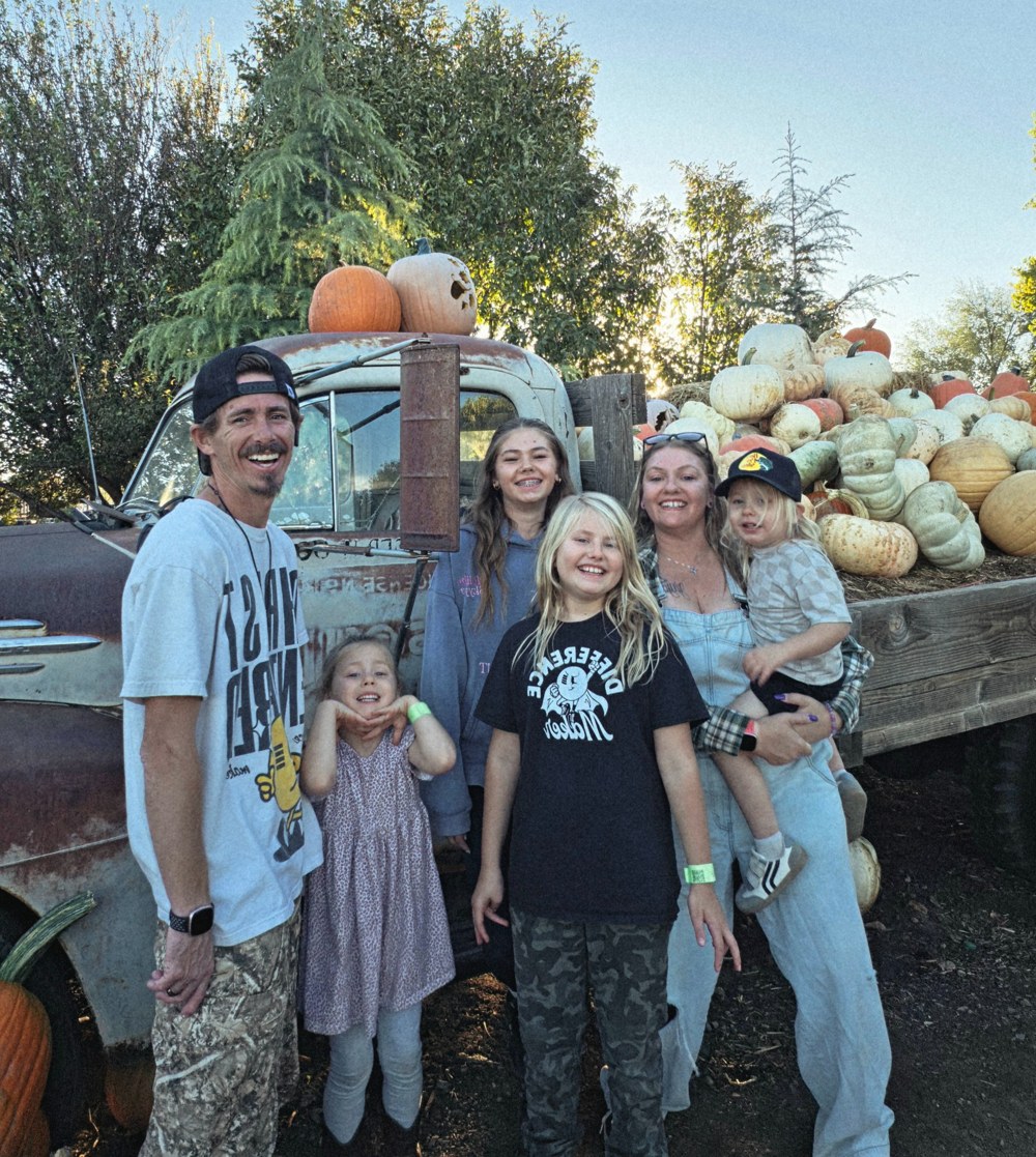 Savannah and her family at a pumpkin patch